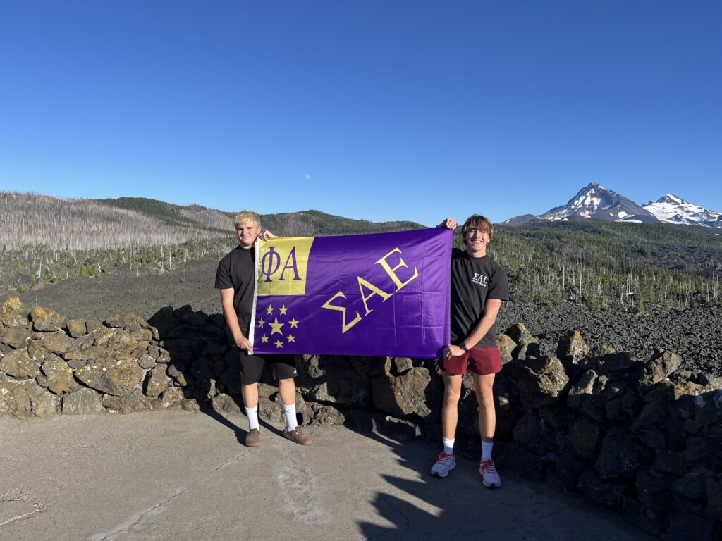 SAE flag photo with Ethan Moore and chapter brother