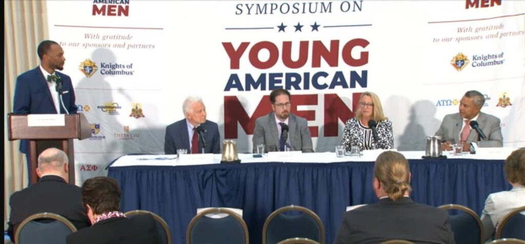 Dr. Anthony Mack moderating panel discussion